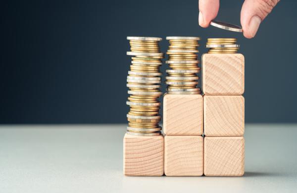 Paying less in the long term, saving for the future, or subsidy money concept