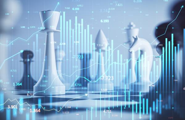 Chess pieces overlaying financial data graphs with blue digital light effects on a blurred background.