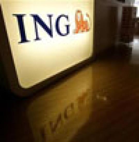 People walk in ING office in Taipei