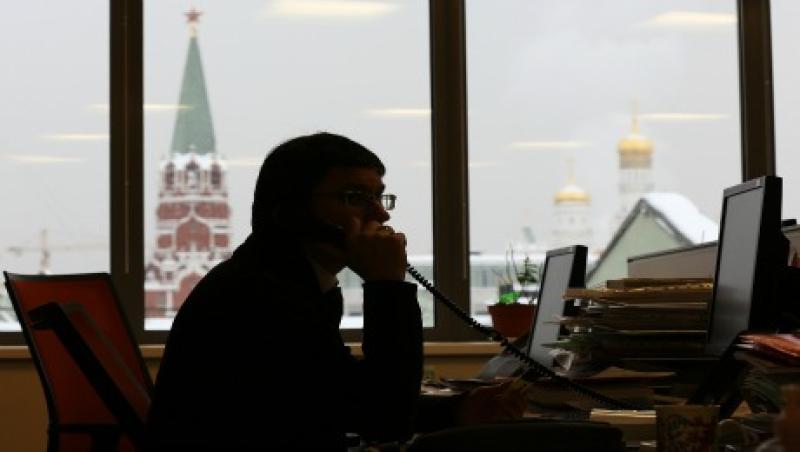 13-11-robert-england-russia-battered-equities-moscow-trader-large.jpg