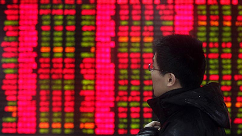 Investors Watch Stock Bords At A Security Firm Investors Watch Stock Bords At A Security Firm