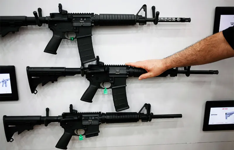 AR-15 rifles on display (Luke Sharrett/Bloomberg) 