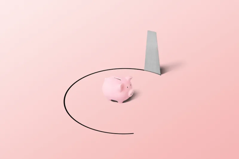 A pink piggy bank resting inside a chalk circle on a pink background.