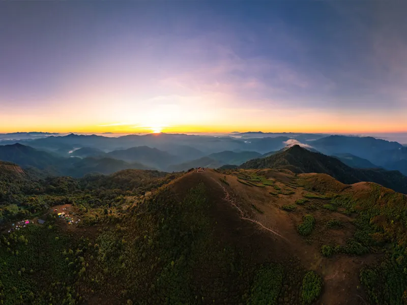 A wide horizon at sunrise, evoking long-term investing
