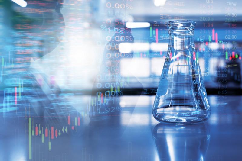 single science glass flask with double exposure scientist holding tube in chemistry blue laboratory with stock market information background single science glass flask with double exposure scientist holding tube in chemistry blue laboratory with stock market information background