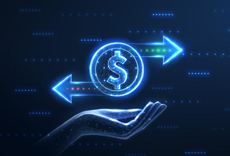 Coin and two right left arrows on hand. Financial service
