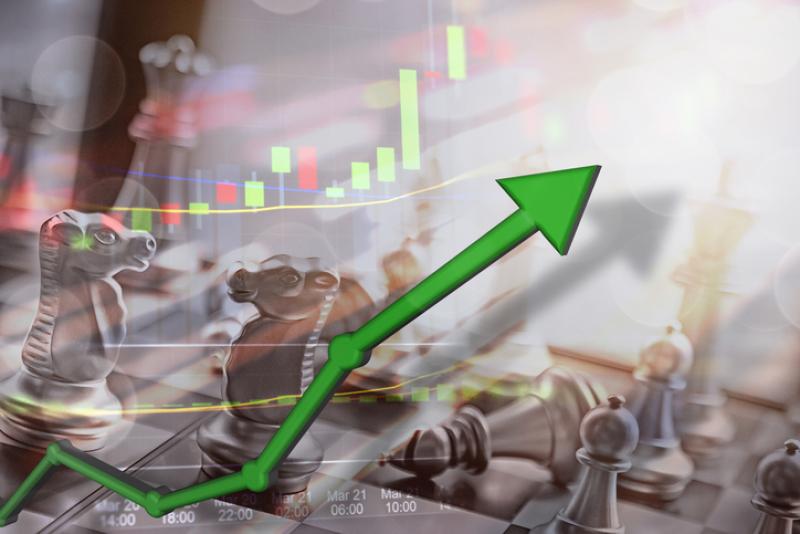 Stock market capital gains and money earned from investing. Upswing concept with money in hand for USD rising and financial firms earning millions. Stock market capital gains and money earned from investing. Upswing concept with money in hand for USD rising and financial firms earning millions.