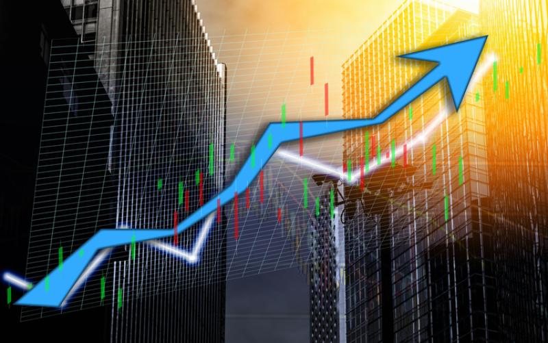Composing with business building and stock chart on background (blue bull chart) Composing with business building and stock chart on background (blue bull chart)