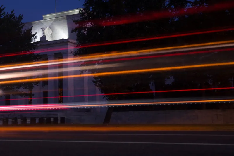 Andrew Harrer/Bloomberg