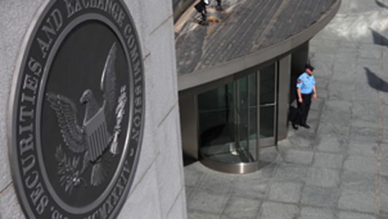 A security officer stands outside the U.S. Securities and Exchange Commission headquarters A security officer stands outside the U.S. Securities and Exchange Commission headquarters