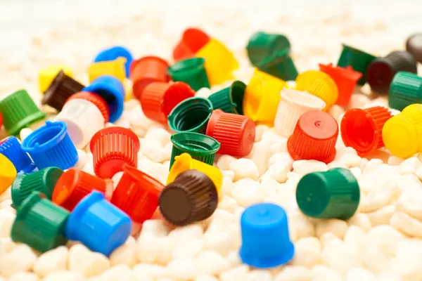 Multi colored caps lids - stock photo (Credit: Igor Radchenko / Getty Images)